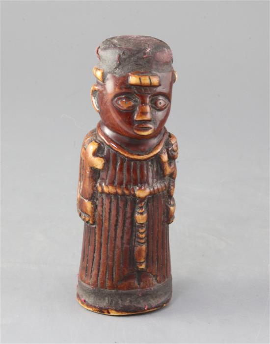 A late 19th century Benin carved ivory figure of a priest, height 6.5in.